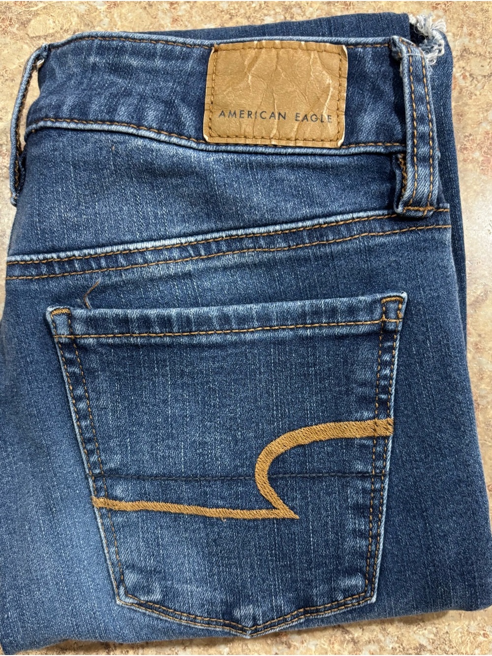 American Eagle Outfitters Women's Dark Blue Skinny Jeans with Brown Patch